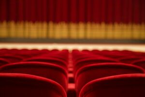 view of stage and curtin from theater seats