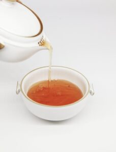 Tea being poured into a cup